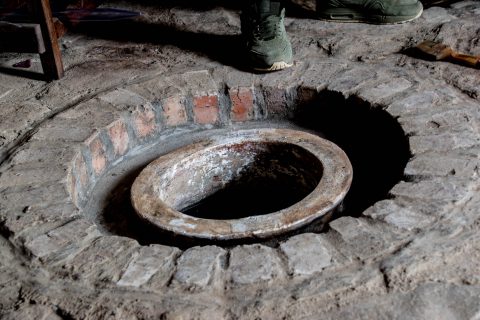 Kvevri pots in the floor with wine, Telavi