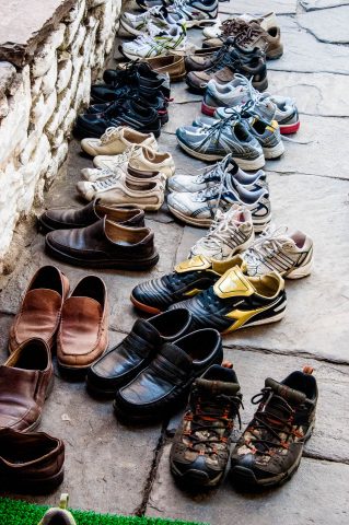 Visitor's shoes, The Kurje Monastic Complex, Bhutan