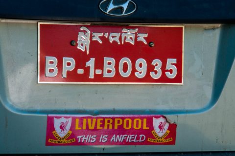 Car number plate & Liverpool sticker, Chamkhar, Bhutan