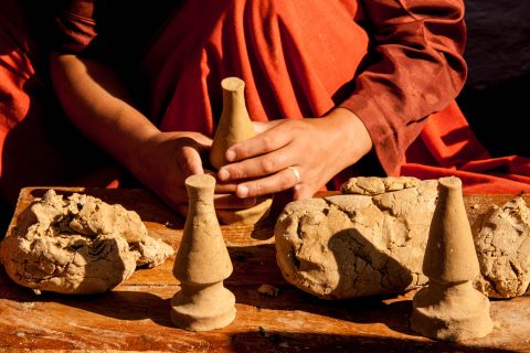 Making clay offerings at Sangchhen Nunnery, Punakha, Bhutan