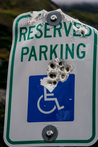 Bullet damaged sign, Valdez, Alaska