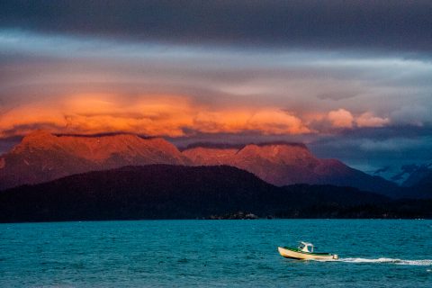 Sunset across Kachemak Bay from hotel on Homer Spit, Alaska
