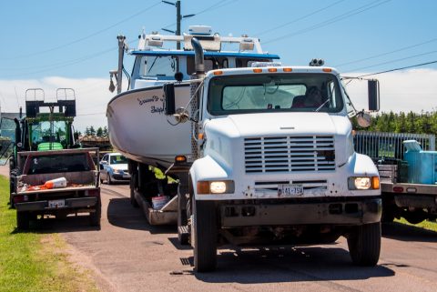 Moving lobster boat, North Cape, PEI