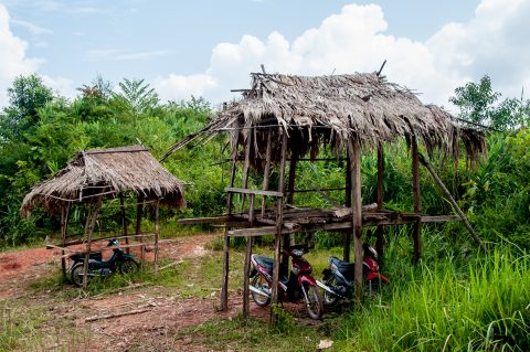 Motorcycle garage, Akha village, Laos