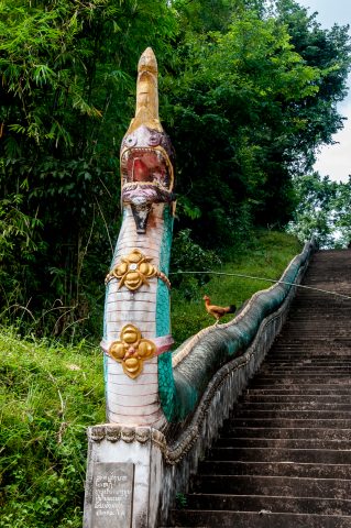 Entance to Buddhist temple, Akha village, Laos