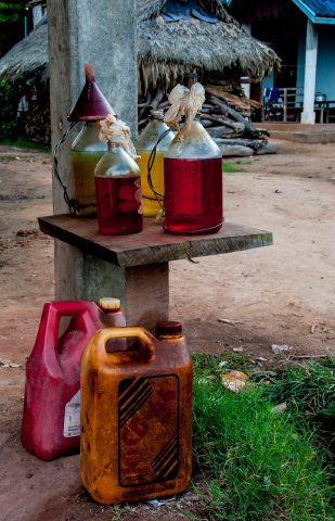 Petrol for sale,  Akha village, Laos