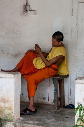 Wat Xieng Thong monk, Luang Prabang, Laos