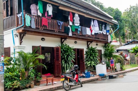 Doing the washing on pavement, Luang Prabang, Laos