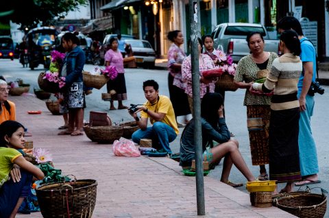 Waiting to give breakfast alms, Luang Prabang, Laos