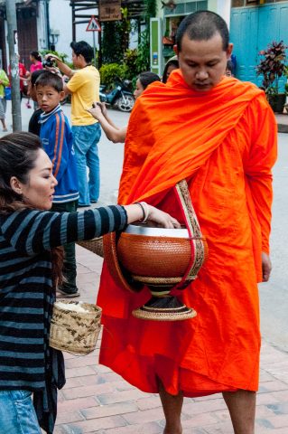 Receiving breakfast alms, Luang Prabang, Laos