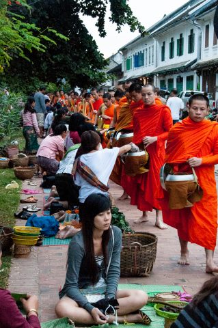 Giving  & receiving breakfast alms, Luang Prabang, Laos