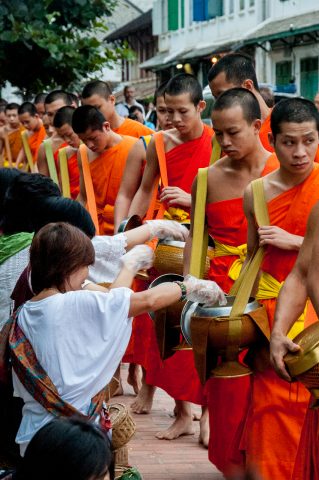 Receiving breakfast alms, Luang Prabang, Laos