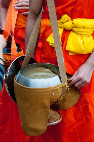 Receiving breakfast alms, Luang Prabang, Laos