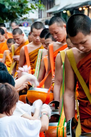 Receiving breakfast alms, Luang Prabang, Laos