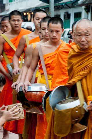 Receiving breakfast alms, Luang Prabang, Laos