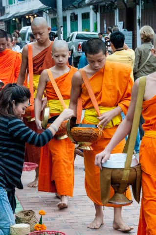 Giving  & receiving breakfast alms, Luang Prabang, Laos