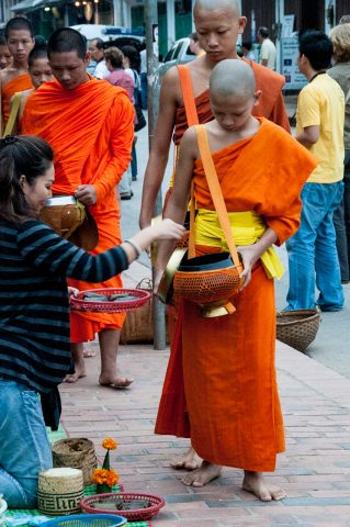 Giving  & receiving breakfast alms, Luang Prabang, Laos