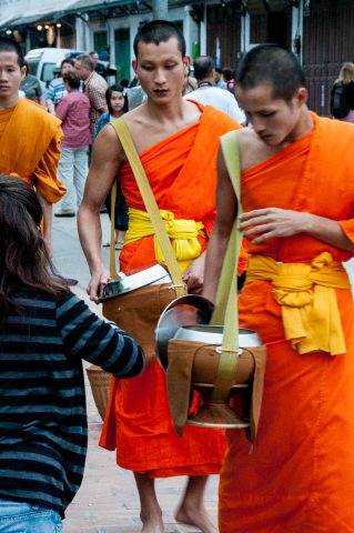 Giving  & receiving breakfast alms, Luang Prabang, Laos