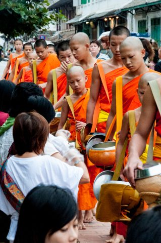 Giving  & receiving breakfast alms, Luang Prabang, Laos