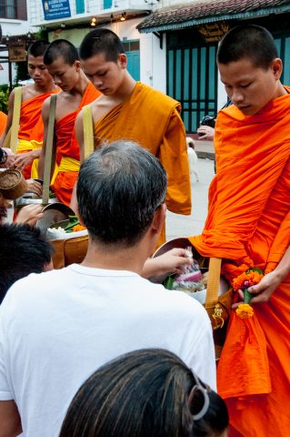 Receiving breakfast alms, Luang Prabang, Laos