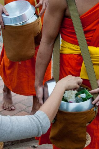 Receiving breakfast alms, Luang Prabang, Laos