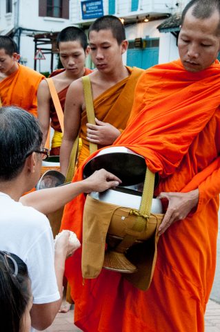 Receiving breakfast alms, Luang Prabang, Laos