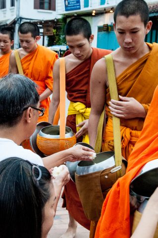 Receiving breakfast alms, Luang Prabang, Laos