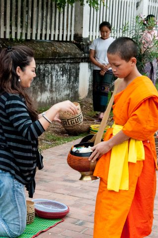Giving  & receiving breakfast alms, Luang Prabang, Laos
