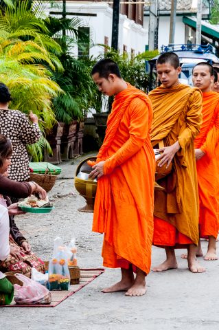 Receiving breakfast alms, Luang Prabang, Laos