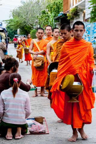Receiving breakfast alms, Luang Prabang, Laos
