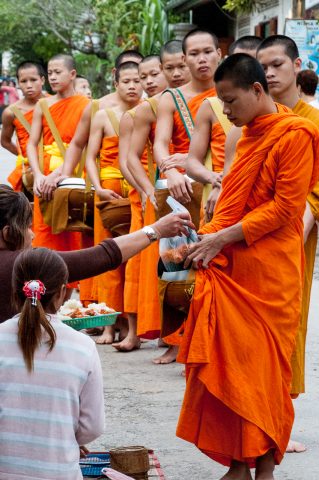Receiving breakfast alms, Luang Prabang, Laos
