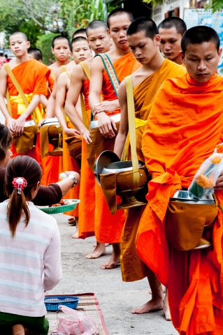 Receiving breakfast alms, Luang Prabang, Laos
