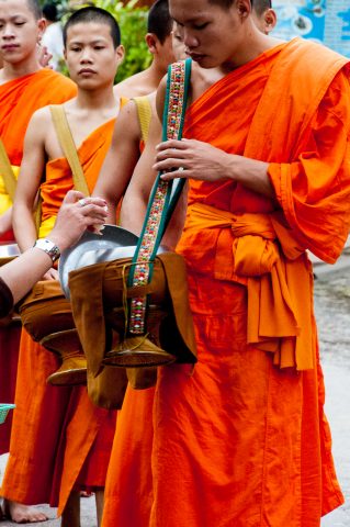 Receiving breakfast alms, Luang Prabang, Laos