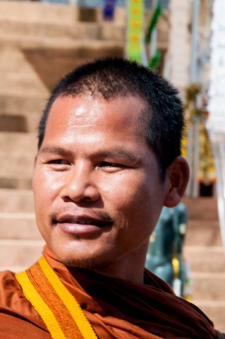 Monk at Phra Chiang Saen Si Phaendin,  Golden Triangle, Thailand