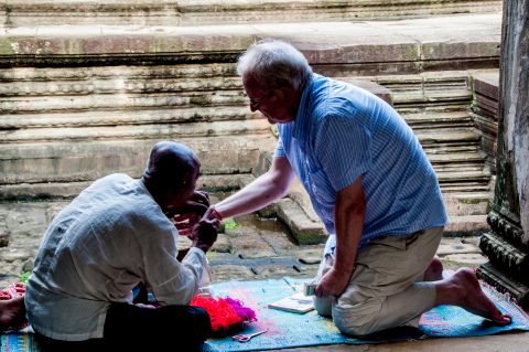 Receiving bracelet at Angkor Wat