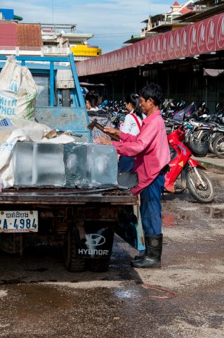 Ice man at market, Battambang
